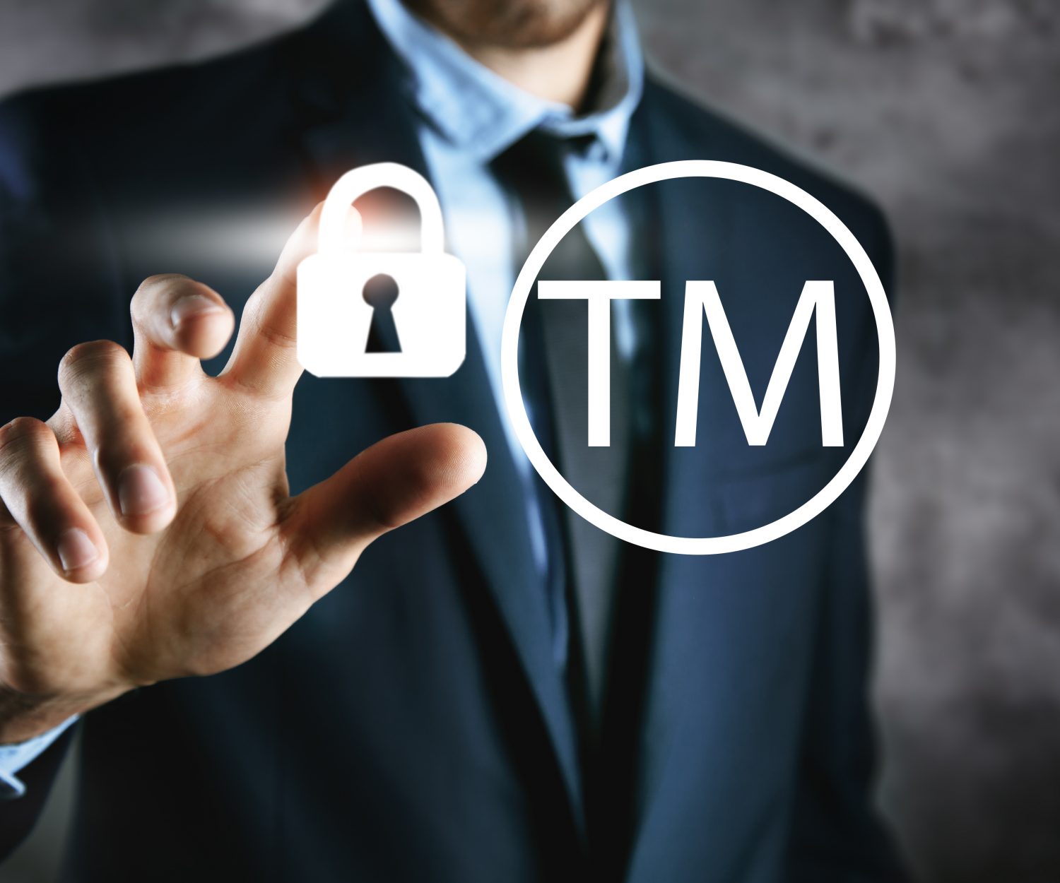 businessman clicks on screen brand concept with lock